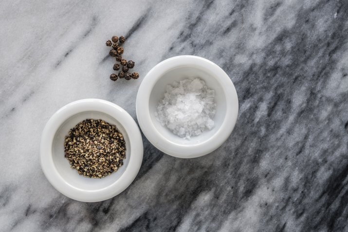 Salt and pepper on marble
