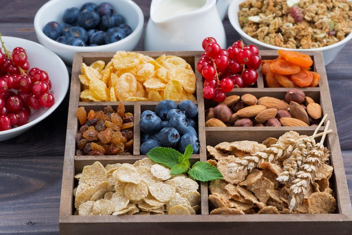 breakfast cereal and other ingredients in a wooden box