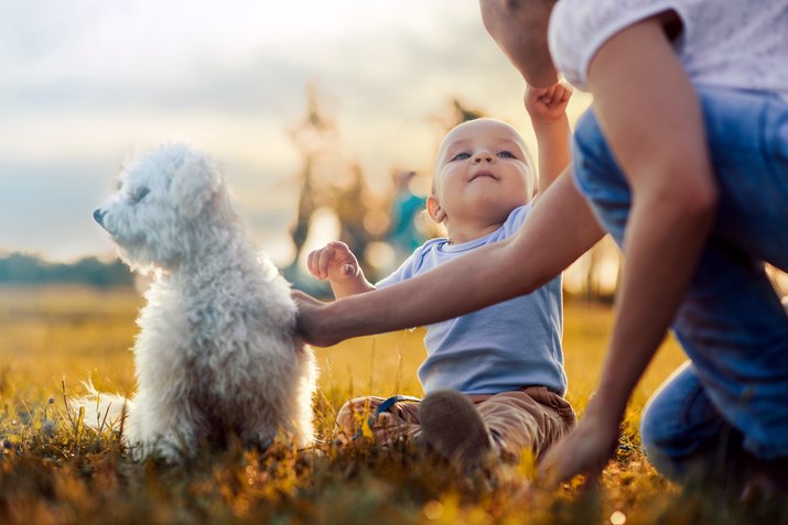 Mother and son with puppy