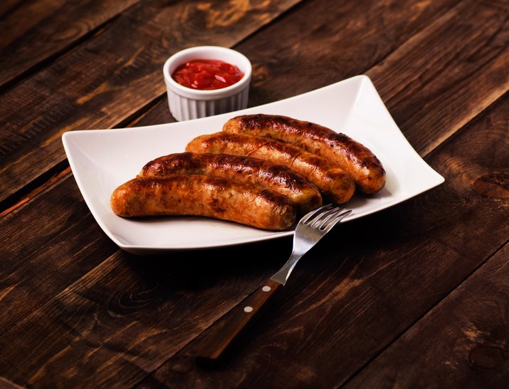Grilled sausages with sauce ketchup