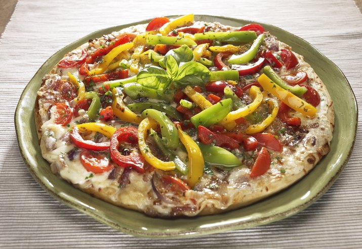 Pizza with peppers and basil