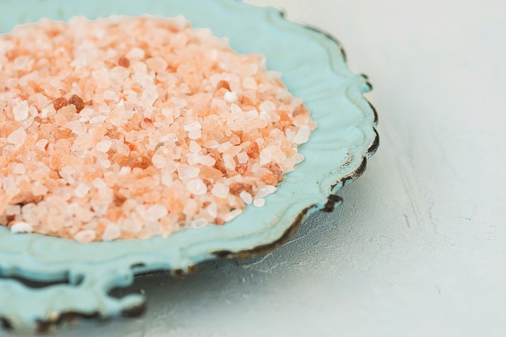 Pink Himalayan Salt on Vintage Turquoise Plate White Stone Tabletop Wellness Spa Healthy Diet Nutrition Ayurveda Clean Minimalist Image Copy Space