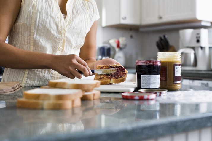 Woman Making Sandwiches