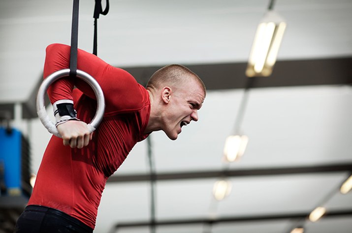 Man struggling through his CrossFit workout