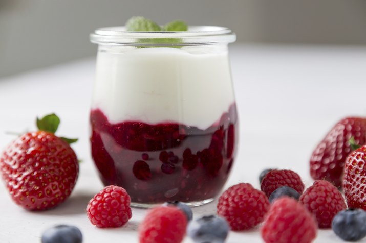 Red fruit compote with mint leaves and