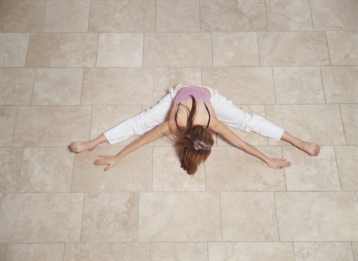 High angle view of woman practicing yoga