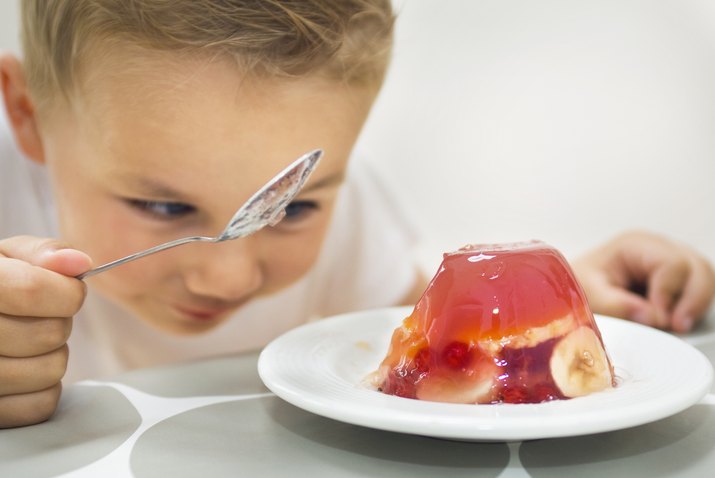 child looking at gelatin dessert 