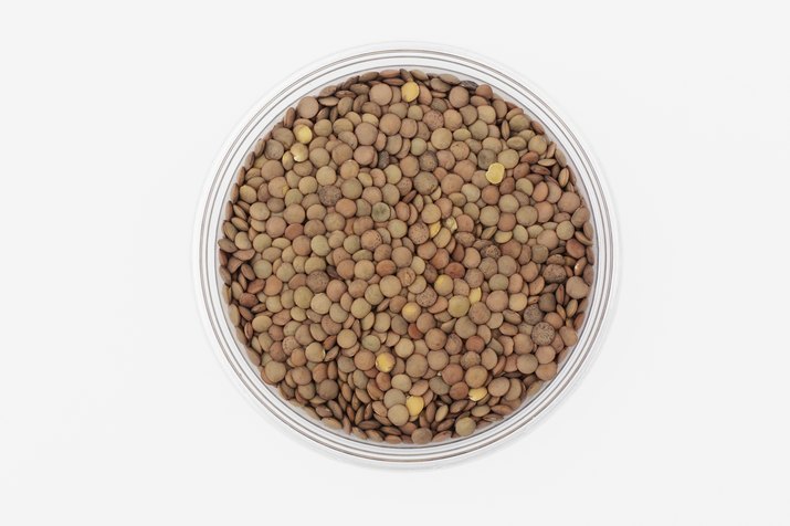 Bowl of uncooked lentils, overhead view