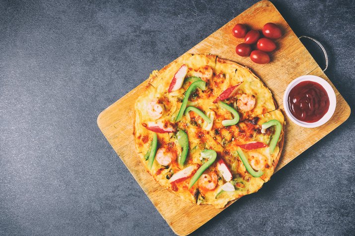 vintage filtered pizza with seafood paprika and tomatoes