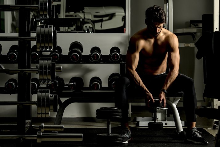 Young man training in the gym