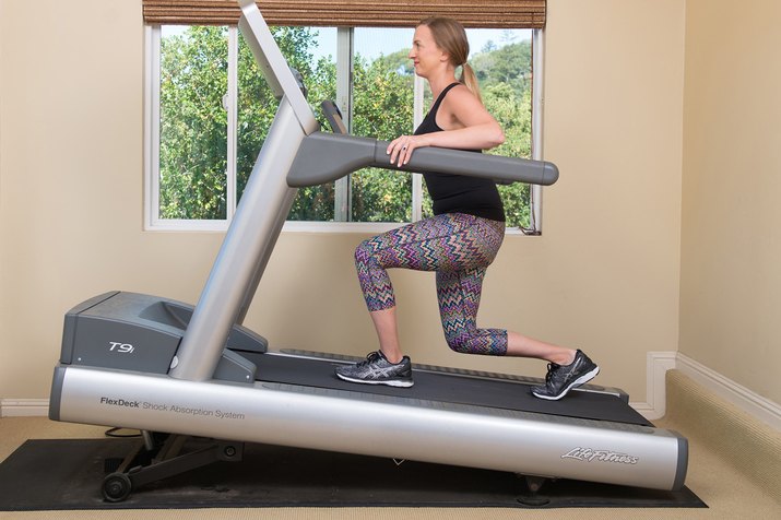 Mature woman running on a treadmill
