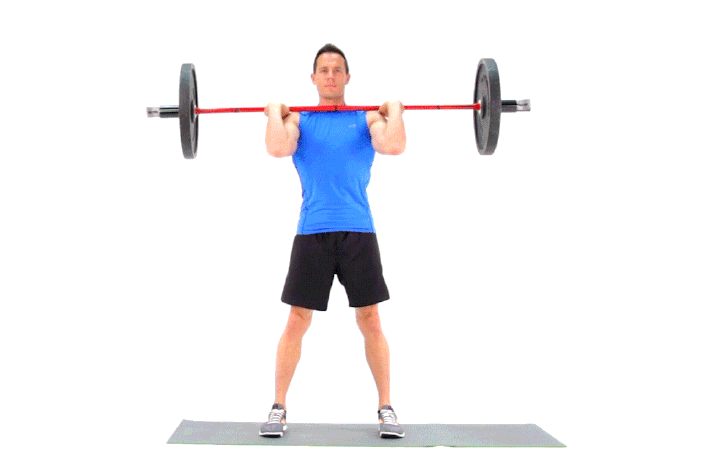 Athlete performing squat with barbell