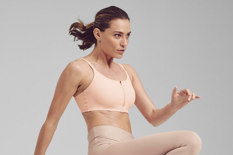 woman wearing athleta empower bra