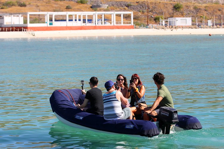 Team in the dinghy going to the lab