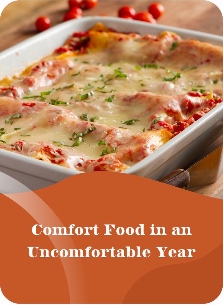 lasagna in white casserole dish with text comfort food in an uncomfortable year on orange background