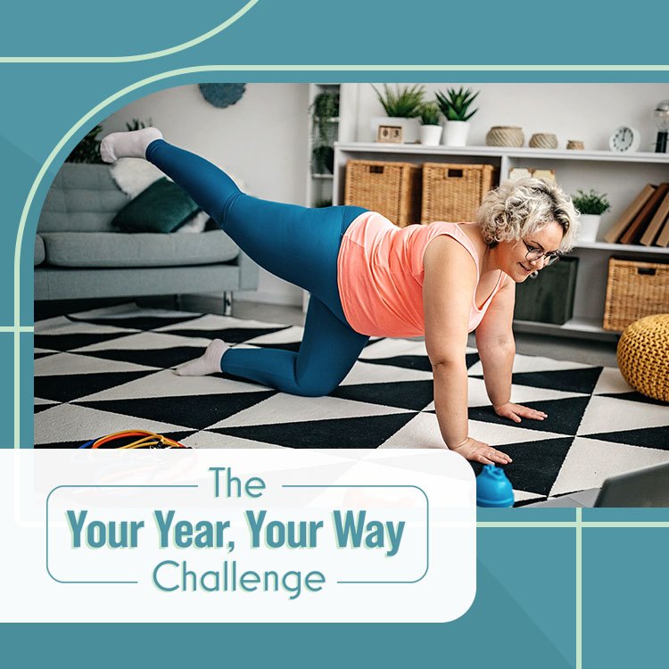 woman doing home workout on tiled floor with laptop and resistance bands for your year your way challenge