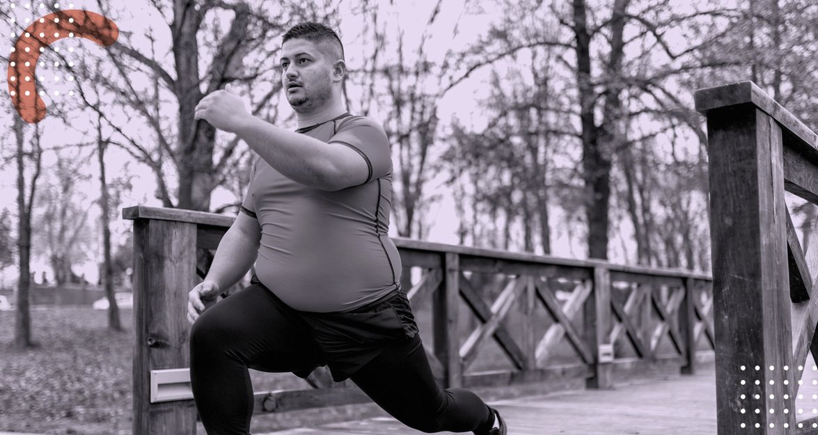a person doing a lunge outside getting ready to exercise